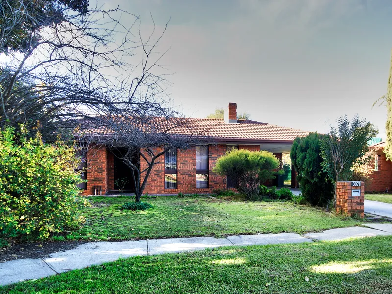 Solid, affordable four bedroom brick home