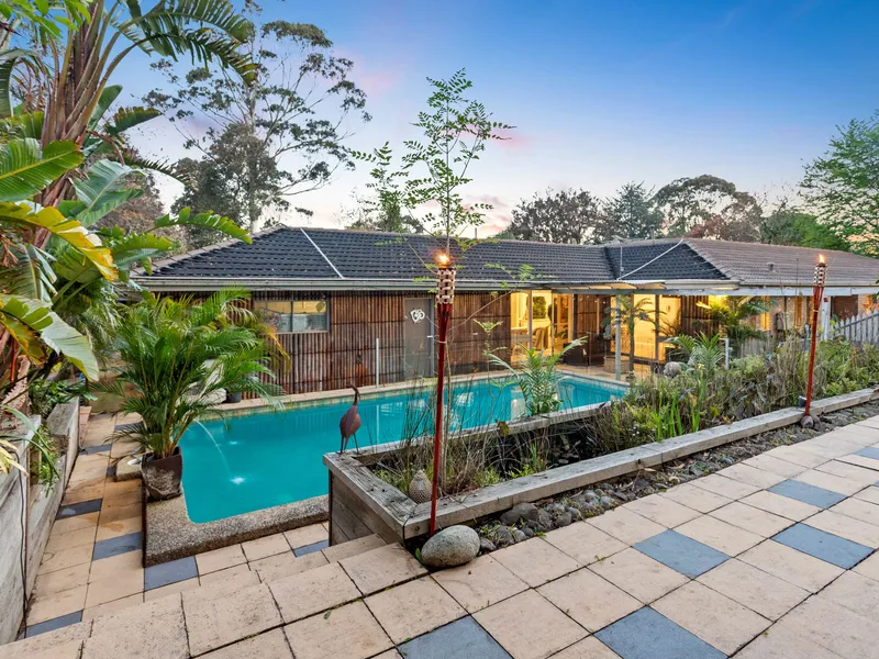 RESORT STYLE LIVING WITH ACREAGE FEELS