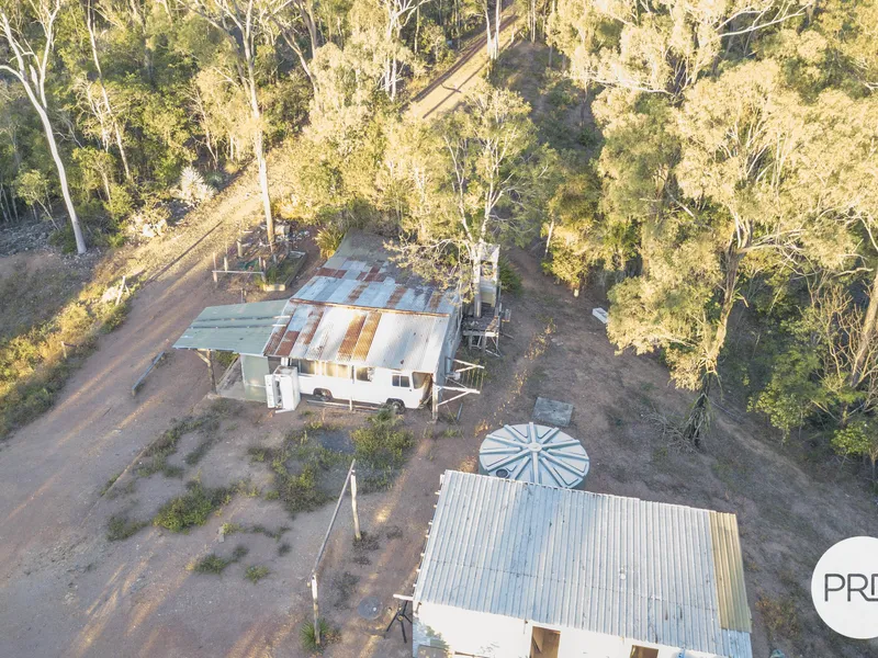 91 acres of secluded undeveloped land with a weekender