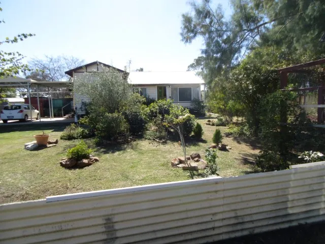 Queenslander nestled in beautiful gardens