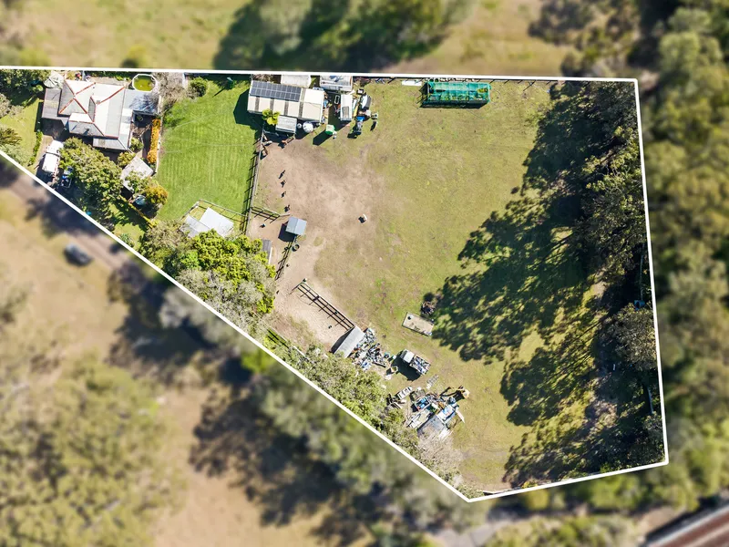 Prime 2 Acre Estate with Endless Possibilities: