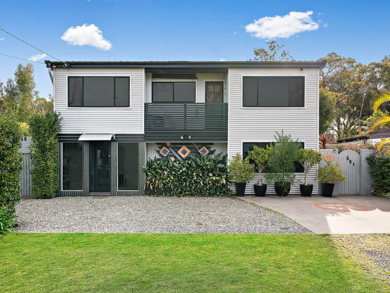 Dual income private oasis with water glimpses