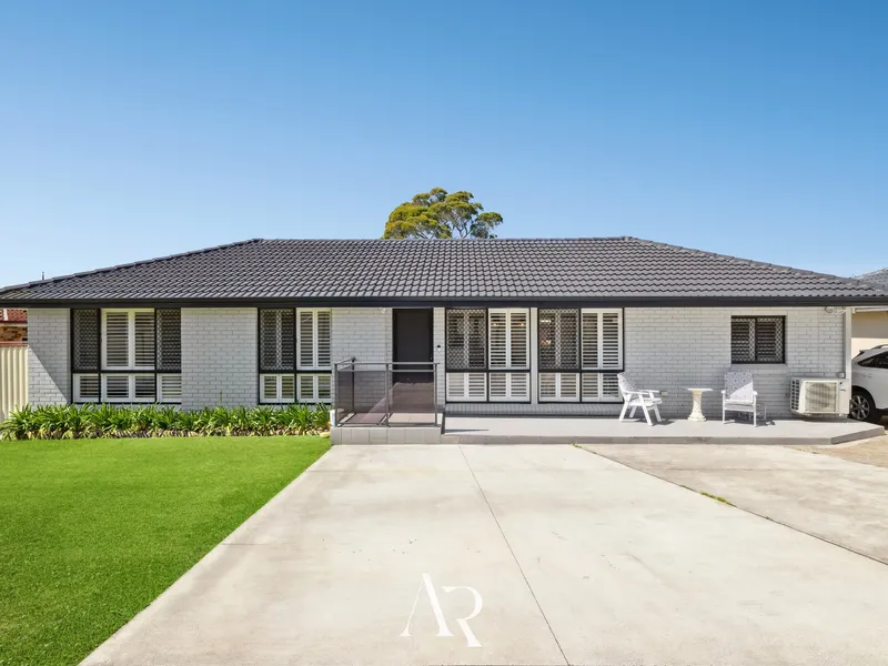 Immaculate French Provincial Home with Modern Elegance and Sunlit Spaces