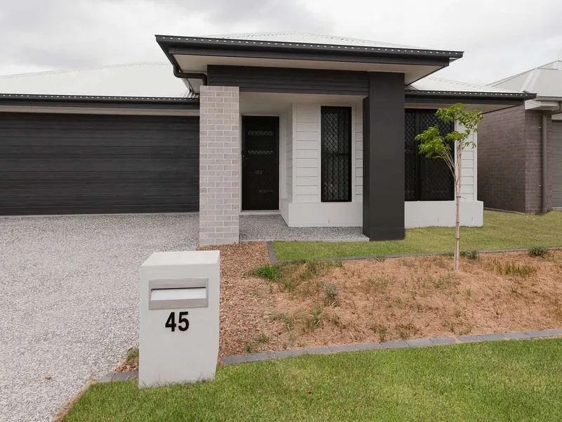 NEAR NEW 4 BEDROOM HOME WITH SEPARATE LIVING!