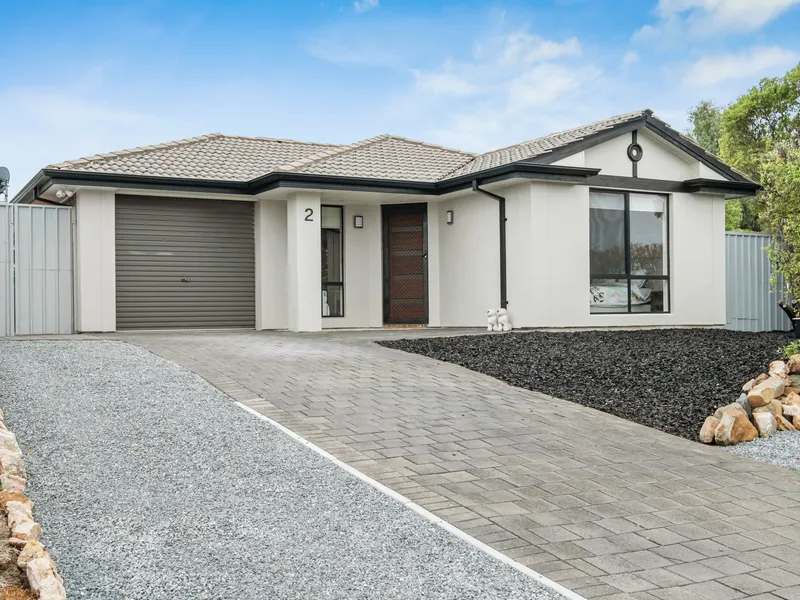 A tastefully updated three-bedroom home, showcasing contemporary designs throughout a fully functional floorplan - what's not to love?