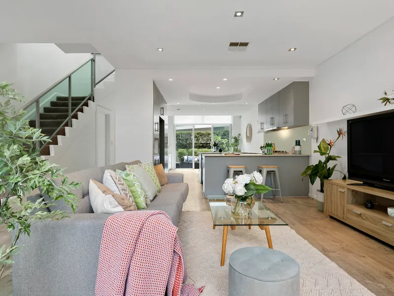 Luxurious Full Brick Townhouse: Light-Filled, One Common Wall, Double Width Garage With Internal Access, North Facing & Walk To Local Amenities!