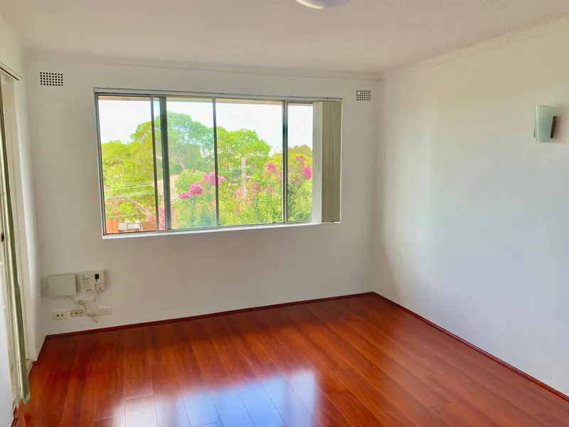 Two bedroom top floor unit with city view