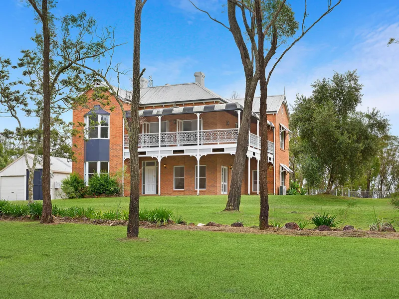 A commanding storybook country manor
