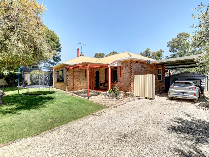 Solid brick low maintenance family home