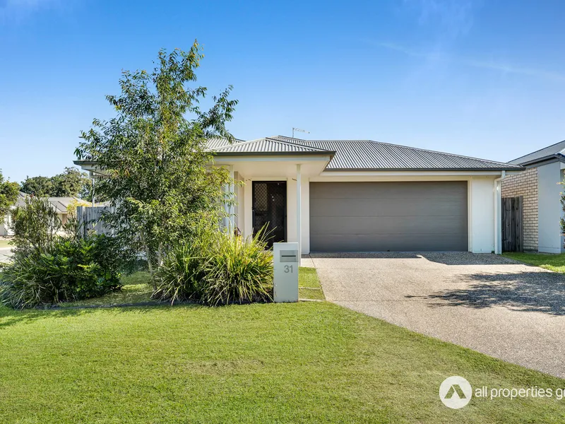 Modern Family Home with Contemporary Amenities: Stylish Corner Block Residence for Comfort and Functionality.