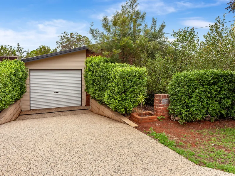 SECURE THREE BEDROOM HOME WITH GREAT BACK YARD