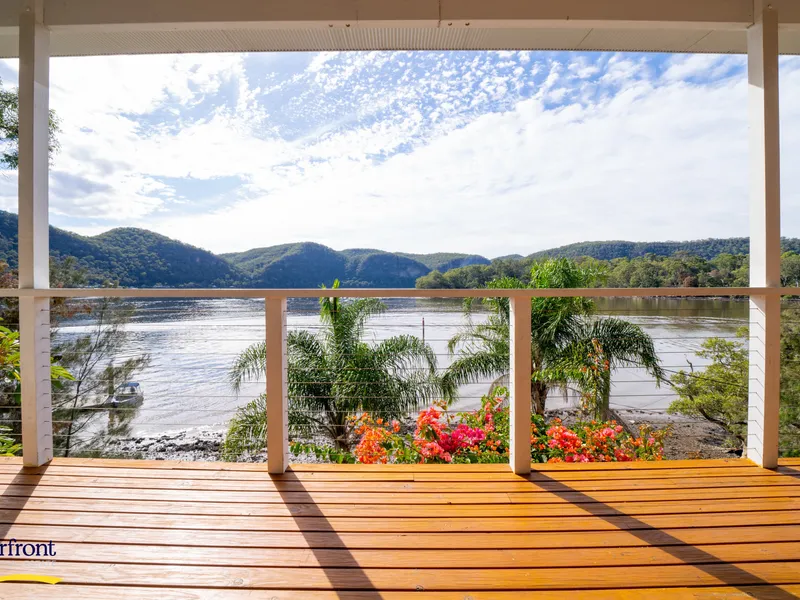 Riverside Retreat in Prime Position with Glorious Panoramic Views!