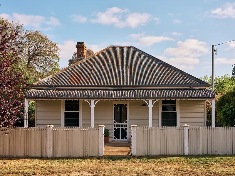 Renovated 1890s cottage seamlessly blends old-world charm with new-world comforts, located in the heart of town.