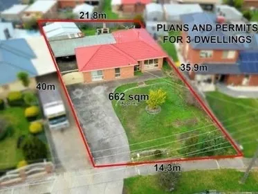 A Great Home with Plans & Permits for 3 Townhouses.