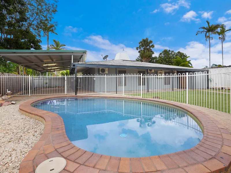 Huge undercover entertaining area adjoining in-ground pool