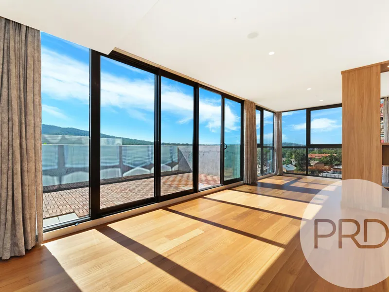 Light filled home withbreathtaking views, right next to Canberra Center! Move in Now!
