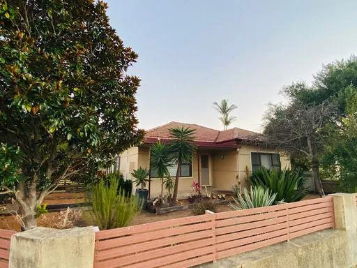 LARGE 4 BEDROOM HOME ON A BIG CORNER BLOCK