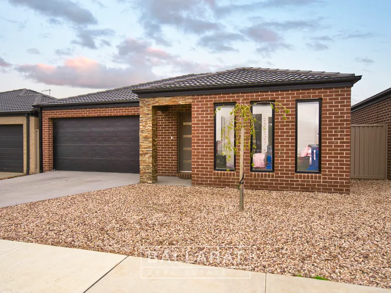 WELL MAINTAINED AND MODERN THREE BEDROOM BRICK HOME