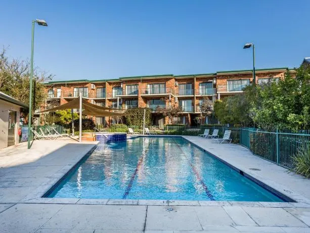 RARE POOLSIDE TWO STOREY IN SECURITY COMPLEX