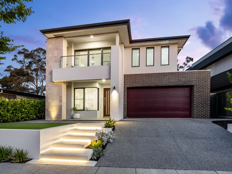 Merge nature & luxury in a Metricon marvel stealing panoramic gully views.