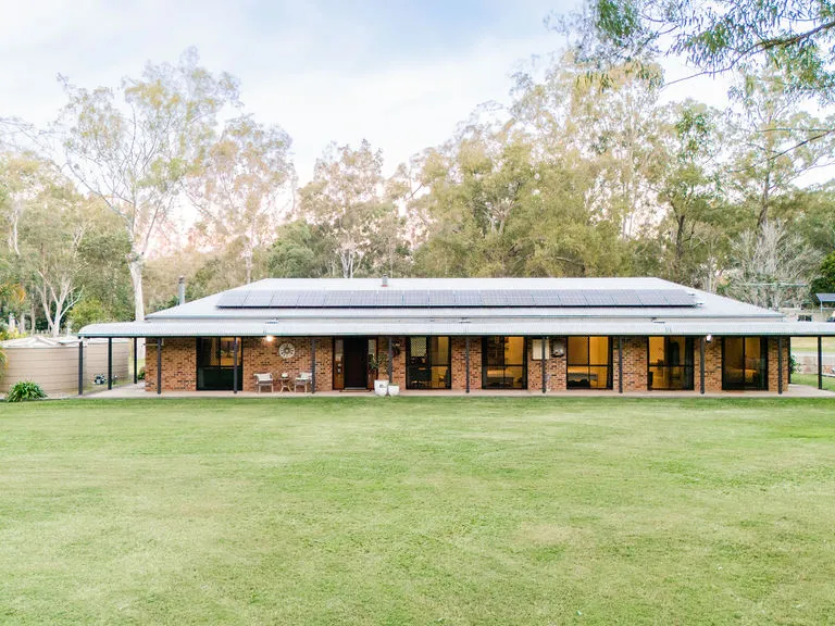 Idyllic Country Retreat: Spacious Family Home with Extensive Outdoor Amenities at 96 Maranoa Dr, Logan Village