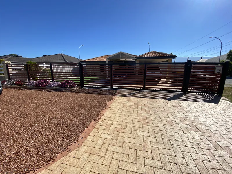 Neat and Secure 4 Bedroom Home With In Ground Pool