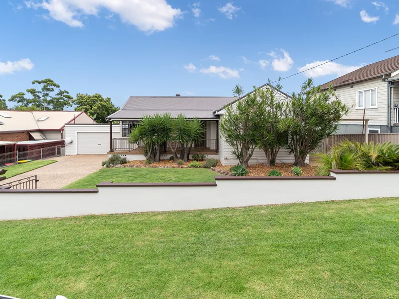 Put simply, you’ll love the pool, two driveways, and super handy location
