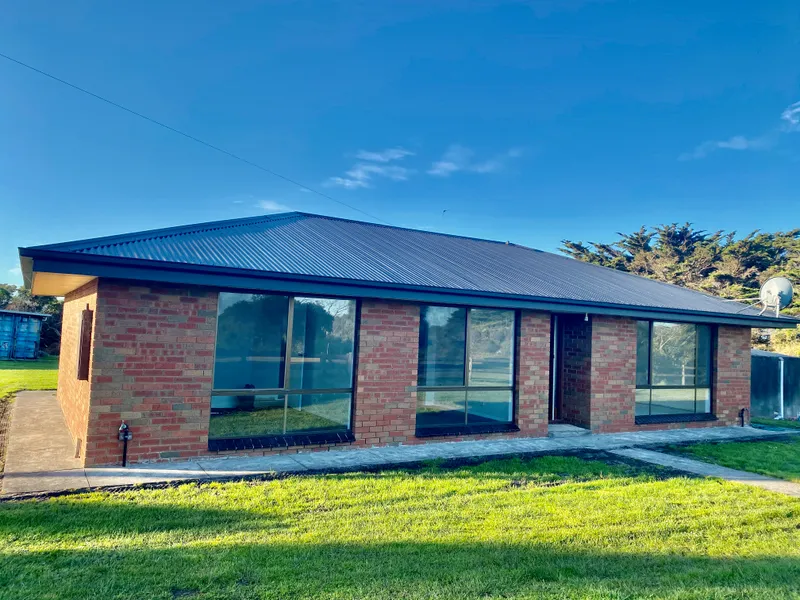 Fully renovated Brick home offering ocean views