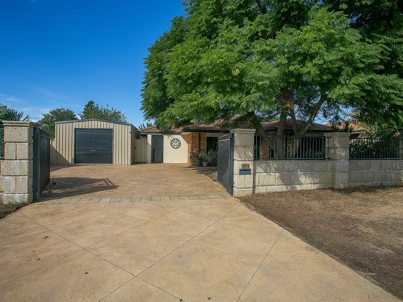 Massive Home with 5 Bedrooms, Family Room, and Massive Powered Workshop!