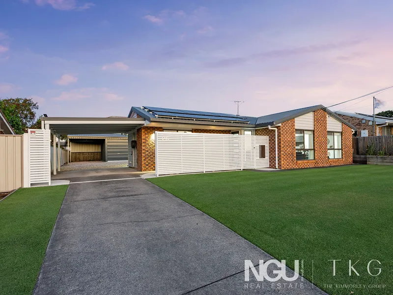 FULLY RENOVATED HOME WITH EXPANSIVE REAR YARD ACCESS & 3-BAY SHED