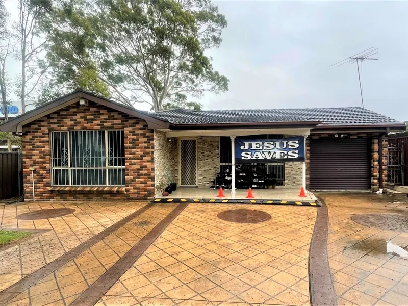 FOUR BEDROOM BRICK HOME