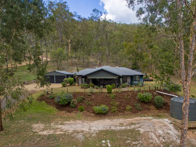 A PEACEFUL FAMILY HAVEN ON 2.5 ACRES