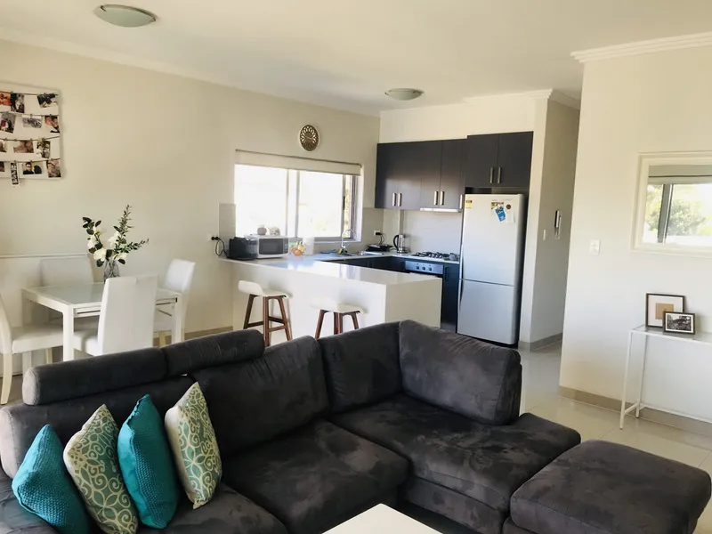 CONEVNIENTLY LOCATED OVERSIZED APARTMENT