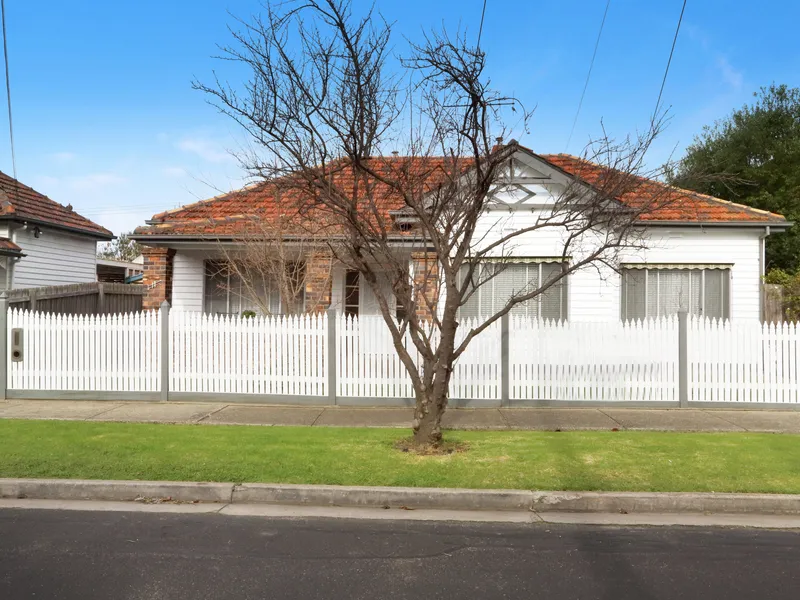 Premiere post war property with dual street frontage.
