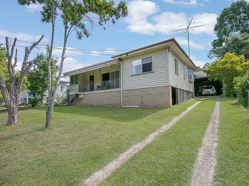 Solid Post War Home with Character Features Overlooking Nature Reserve