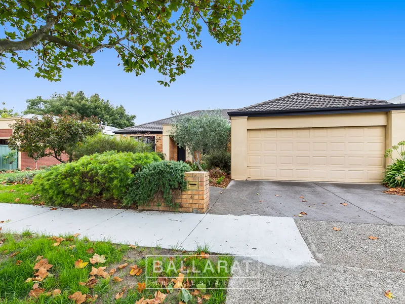 WELL MAINTAINED FOUR BEDROOM HOME IN DESIRABLE LOCATION