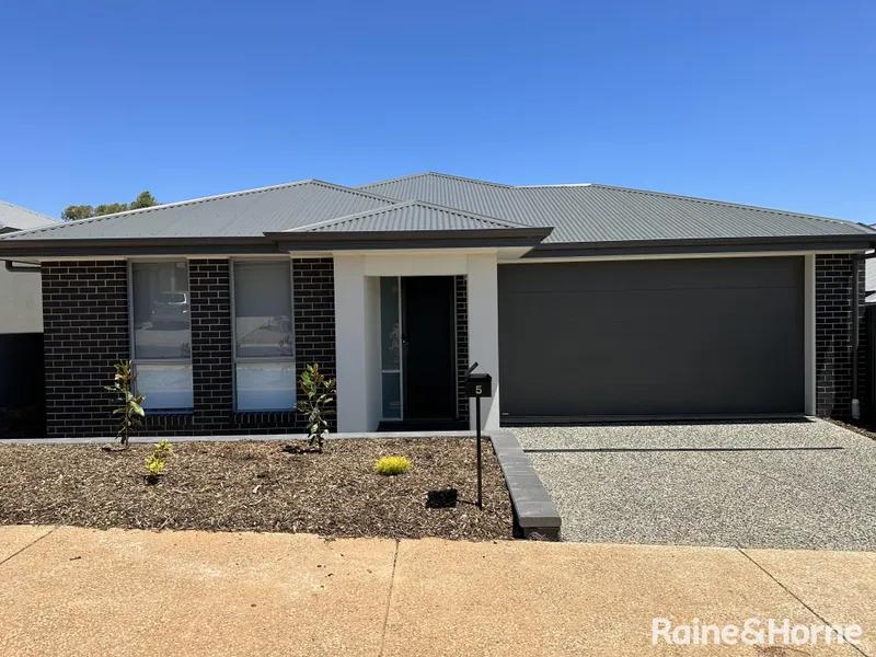 4 Bedrooms + TWO LIVING AREAS!