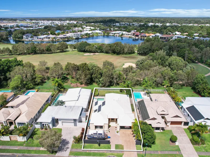 Impressive sized family home with pool in Pelican Waters