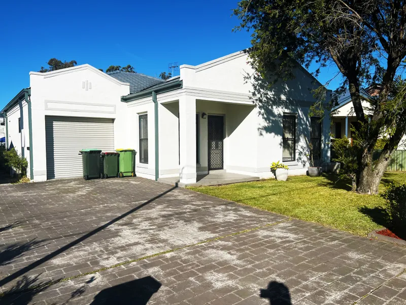 Modern Three-Bedroom Duplex | Conveniently Located | Minutes to Beach and Shops!