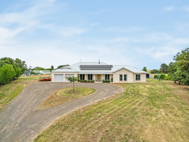 Stunning luxury rural home where country charm meets architectural sophistication.