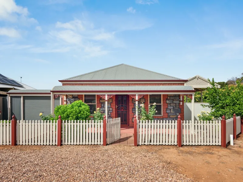 Reproduction Symmetrical Cottage On A Car-Friendly Corner Block
