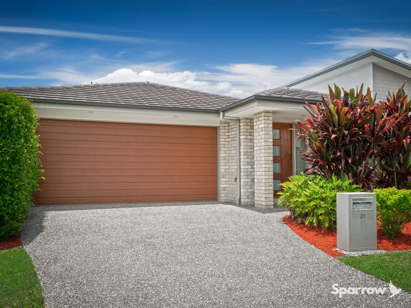 PERFECTLY POSITIONED, SPACIOUS, AND IMPECCABLY MAINTAINED FAMILY HOME