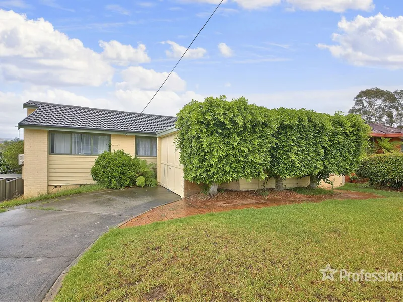 UNIQUE SPLIT LEVEL WITH EXPOSED RAKED CEILINGS 