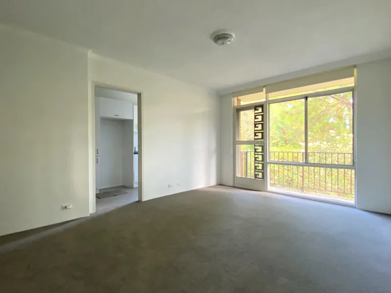 TWO BEDROOM SECURITY APARTMENT WITH PARKING