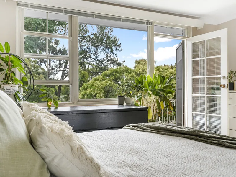 Low-Maintenance Living in a Private Treelined Haven