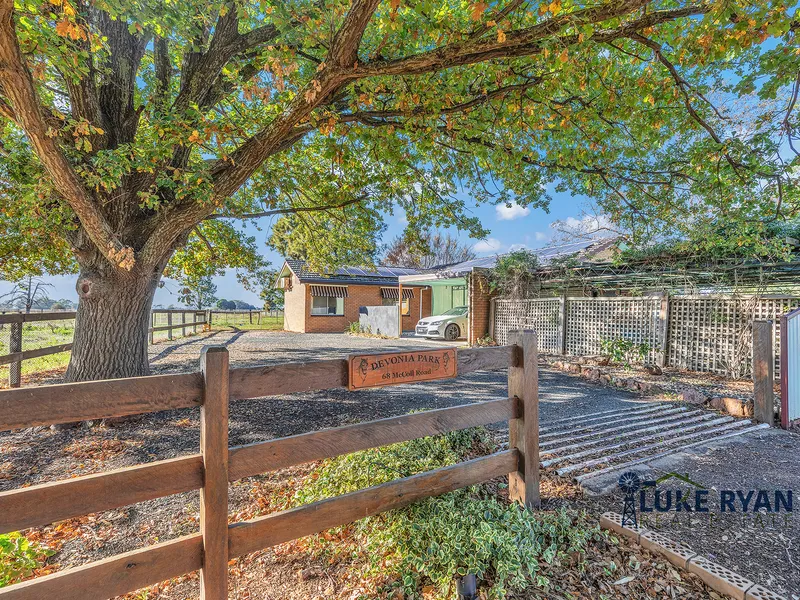 QUALITY HOME ON 6 ACRES