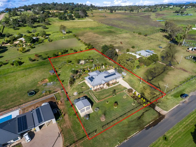 OUTSTANDING HOME ON OVER AN ACRE