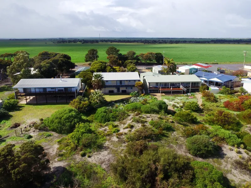 Absolute Beachfront living* Set on 980m2 with large Shed plus carport * Private coastal reserve in front *                
