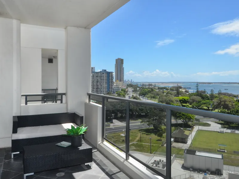 Rare Corner Top Floor Unit in Breezes – Two Bedroom plus Study Apartment