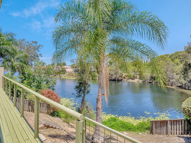 Perfect place to call home with Lake views in a quiet cul de sac
